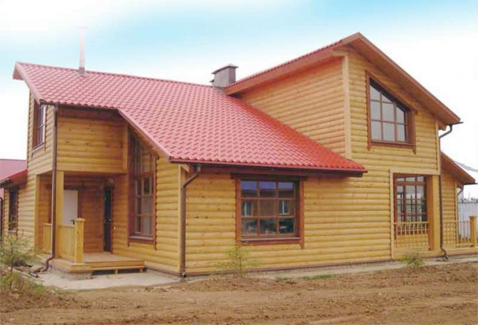 Приклад оздоблення приватного будинку дерев'яним блоком Хаусом